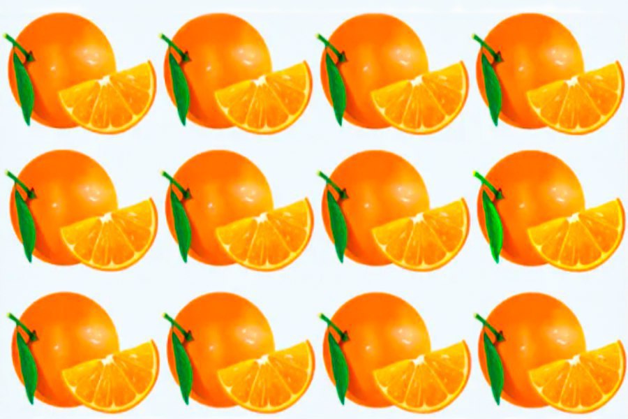 a group of oranges with green leaves